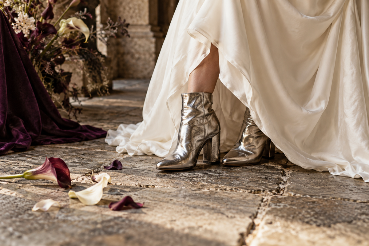 AI-generated silver boots and ivory dress detail